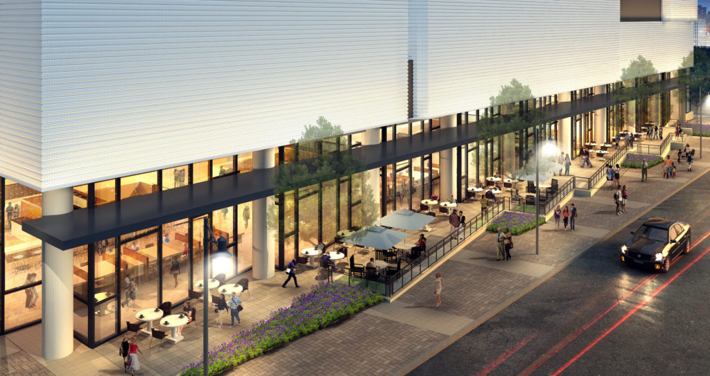 Lyric Center Garage and Plaza Patio Exterior Semi-Aerial Dusk